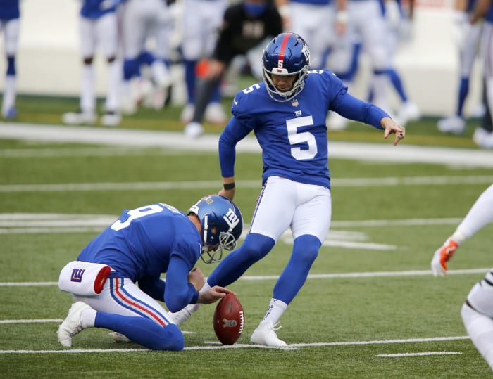 Nov 29, 2020; Cincinnati, Ohio, USA; New York Giants kicker Graham Gano (5) hits one of his four field goals during the game against the Cincinnati Bengals at Paul Brown Stadium.